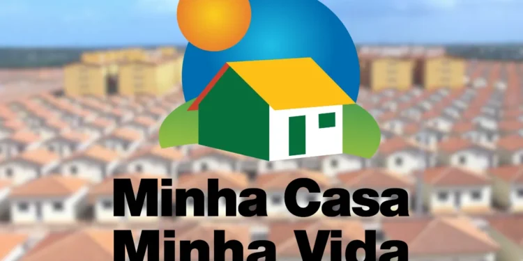 Logo do programa Minha Casa Minha Vida sobre um fundo desfocado de casas.