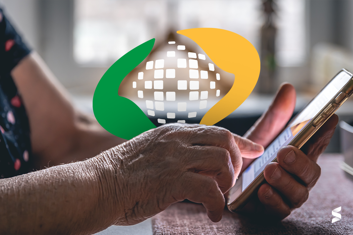 Pessoa usando o celular para acessar o Meu INSS, facilitando o acesso digital aos serviços da Previdência Social.