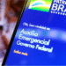 Tela de notificação do Auxílio Emergencial do Governo Federal no celular