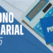 Cartão PIS/PASEP sobre uma mesa com cédulas e uma calculadora, anunciando o abono salarial de 2025, com PIX de até R$ 1.518