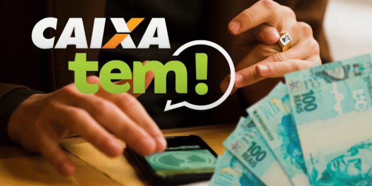 Pessoa usando o aplicativo Caixa Tem no celular com notas de 100 reais ao lado.