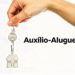 Chave com chaveiro de casa e nome Auxílio-Aluguel.