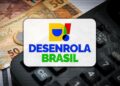Logo do Desenrola Brasil sobre dinheiro e calculadora representando renegociação de dívidas