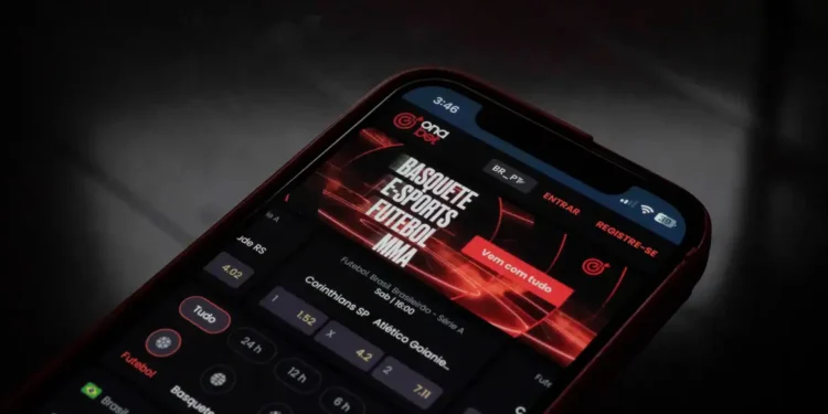 Desenrola Brasil bloqueia casas de aposta: imagem ilustrativa de tela de celular exibindo aplicativo de apostas esportivas online, em referência à restrição imposta pelo programa do Governo Federal aos beneficiários da renegociação
