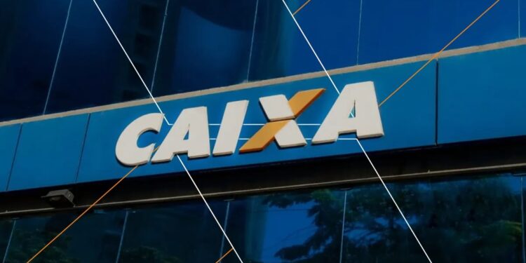 Imagem ilustrativa da fachada de uma agência da Caixa, banco que libera o Saque Calamidade nas cidades habilitadas.
