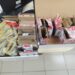Caixas de papelão com frascos de medicamentos apreendidos pela Polícia Federal no Aeroporto de Maringá