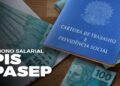Carteira de trabalho azul sobre cédulas de 100 reais com a inscrição PIS/Pasep, ilustrando as cotas do antigo fundo