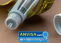 Injetor com agulha e selo “ANVISA sem desinformação”.
