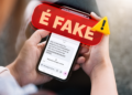 Imagem ilustrativa de celular exibindo mensagem de texto que ameaça interromper benefício por falta de prova de vida, com selo indicando conteúdo falso.