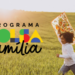 Criança correndo em campo com pipa e logo do Programa Bolsa Família.